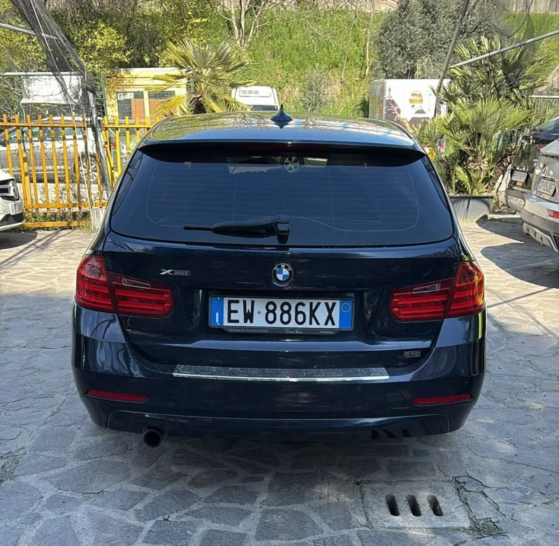 BMW Serie 3 318d Touring xdrive — foto 6