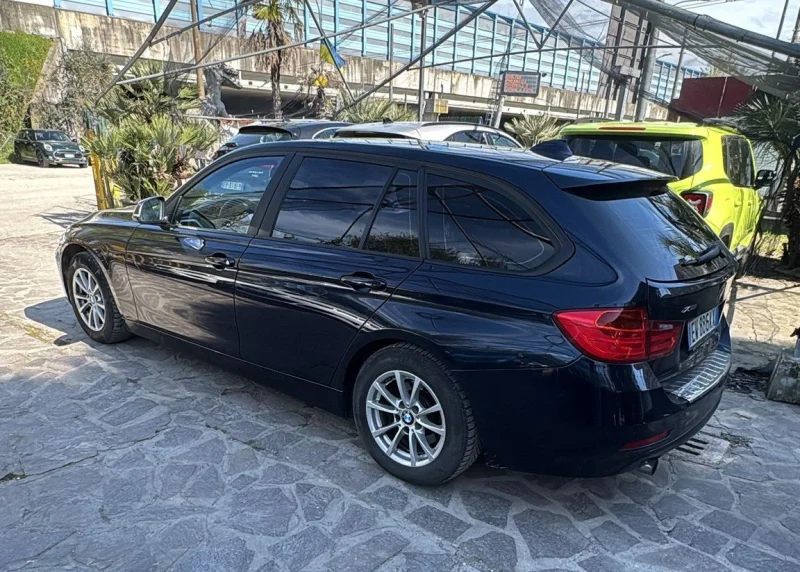 BMW Serie 3 318d Touring xdrive — foto 4